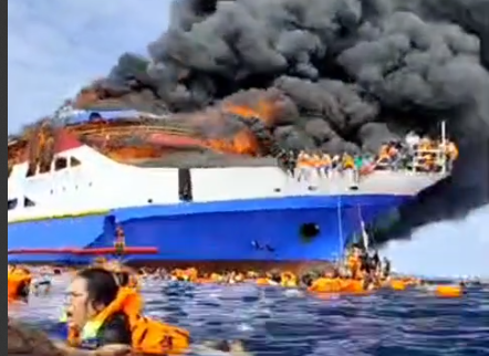 "Kapal Motor (KM) Gregorius Barcelona V mengalami kebakaran hebat saat berlayar dari Talaud menuju Manado di perairan Pulau Talise, Kecamatan Likupang Barat, Kabupaten Minahasa Utara, pada Minggu (20/07/2025)."